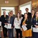 Business professionals inducted into Sigma Chi Mu Tau