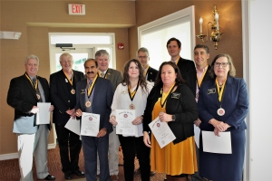 Business professionals inducted into Sigma Chi Mu Tau